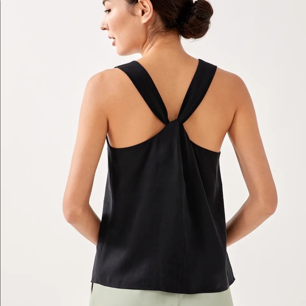 New with tags. Black twist back tank top.